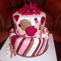 Sugar N' Spice 8" chocolate/choc pudding & 6" white/vanilla pudding, covered in b/c and decorated w/ fondant accents and real cinnamon...