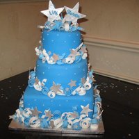 Star Celebration Cake for a double graduation party. Almond and chocolate cake with chocolate mouse and almond buttercream covered in fondant. Decorations...