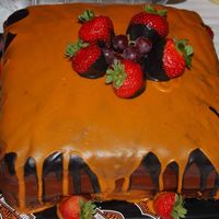 Harley Theme Groom's Cake I tried to make this w/ the Harley colors for my future step dad. This is a strawberry cake with cream cheese filling, chocolate MMF with...