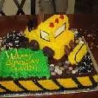 Excavator Cake 12'x15' Sheet cake w/strawberry filling..Everything on this cake is edible...