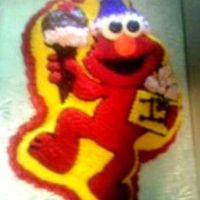 Elmo2.jpg All buttercream, And the eyes are fondant...