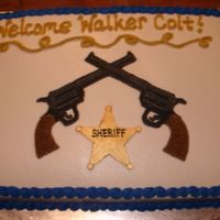 Boy Baby Shower This was a baby shower cake for a little boy whose dad is a police officer. They also wanted a western vibe. Badge is MMF painted with gold...