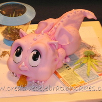 Mystical Mischief - Take2 All edible sculpted sponge cake with gelatine fishbowl and fish tail,lolWon GOLD and 1st place at 'Cake international' @ NEC 2009...