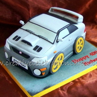 Subaru I got board with doing basic car cake, yaaaaaawn.........So when my friend asked me to do a Subaru for her husband I decided to experiment...