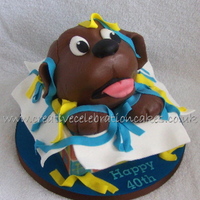 Labrador Puppy A strange request for a 40yr old mans cake, he was having a chocolate labrador for his birthday. I love this one, I think he's soooooo...