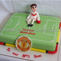 Soccer Cake For a kiddie who plays goalie for his team and supports Man'U.
