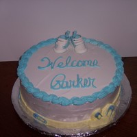 Baby Booties My first attempt at baby shoes. Not too good all around but my friend loved it. 9: round Yellow cake with bettercreme frosting and filling...