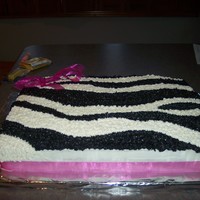 Katie's Zebra Birthday White 1/2 sheet cake with real pink ribbon; zebra pattern freehanded onto cake. TFL!