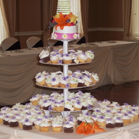 Miller's Wedding Top cake was white with raspberry filling; royal icing flowers attached to regular ribbon with royal icing; cupcakes were chocolate, white...