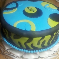 Lime Green And Blue Cake Fondant covered chocolate cake. Its the best fondant job to date!! ;)