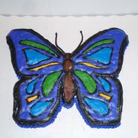 Butterfly Chocolate cake with buttercream icing. I made for my cousins birthday. I used the upside frosting medthod i got off you tube. But revised...