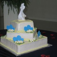 3 Tier Square With Butter Cream. Color Flow Hearts And Gumpaste Daisys This was my first wedding cake