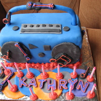 Kathryn's 13Th This was such a fun cake for my niece Kathryn. We threw a suprise rock n' roll party for her 13th. I got this idea from a wilton book...