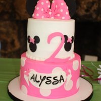 Minnie Mouse Minnie Mouse cake inspired by cake made by robsolano. Two tiered cake with mouse ears (cut craft foam sheet due to travel distance),...
