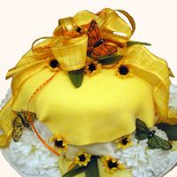 Mothers Day Cake I made this cake for my beautiful mother who loves sunflowers and all things summery. Its a summer table with rolled fondant tablecloth and...