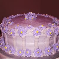 Sweet Purple Just a simple little purple cake with royal icing flowers and buttercream.