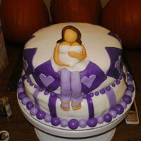 Baby Shower Purple A cake I made for my step sister's shower. It is chocolate with buttercream icing covered in fondant.
