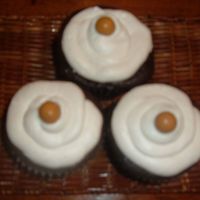 Peanut Butter Cuppies Darn Good Chocolate Cake with a peanut butter flavored bettercream filing and topping.. Topped with a peant butter whopper. Thanks Mel for...