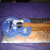 N511853101_1590074_6880.jpg hannah montana cake, all buttercream with a few fondant accents, i ended up fixing the buttercream on the neck before i served it. i was...