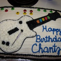 Guitar Hero This is a quick cake I made up for a family member. Her son loves Guitar Hero. All buttercream.