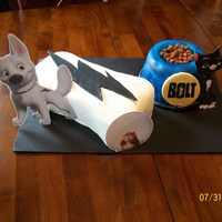 Bolt I printed off pictures of the character and make the stand next to the cake bowl and cake bone