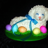 Little Lamb Second attempt at a 3 D Pan, This time it worked yay! It was Italian Cream Cake. Iced in Vanilla buttercream. Used Real dyed hardboiled...