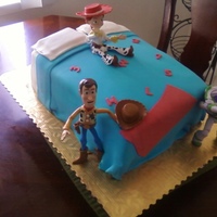 Toy Story Bed Cake I love this cake, a friend found this picture online and asked me to do it for her child's b-day. Fondant covered 1/4 sheet cake and...