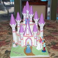 Faiths_Castle_Cake_2.jpg This is a cake I did for my daughters 4th birthday. It's a wilton design.