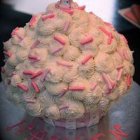 Cupcake Giant cupcake. Used the Wilton pan. Fondant covered bottom. BC covered top with jumbo fondant sprinkles. It was fun to make for my little...