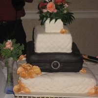 Brown And Ivory Wedding Cake This was my very first wedding cake and despite a transportation "mishap", I'm pretty proud of it. I used Brown and Ivory...