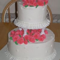 First Tiered Cake This was my first tiered cake, and the final project for the Wilton Course 3 class. I used buttercream instead of fondant. My daughter...