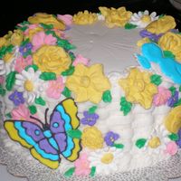Course 2 Final This was my final cake from Wilton's course 2 class. I had so much leftover royal icing I made the butterfly to add to the cake.