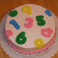 Numbers A single layer 8" cake for Math Night at our school. It was one of the prizes for playing "Cake Walk." I outlined number...
