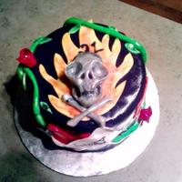 Rock N Roll Cake I made this for my good guy friend's 21st Bday. It has a skull on the top, and has a Cross Canadian Ragweed Logo, and Led Zeppelin...