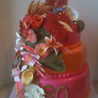 Hawaiian Bouquet Birthday Cake 80th birthday cake with hand made gumpaste flowers which were based on a bouquet she was to be presented with at her birthday.