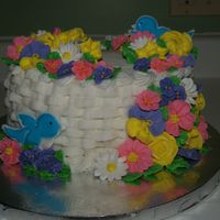 Spring Flower Basket With Bird One of the first cakes I madein the Wilton Course 2.