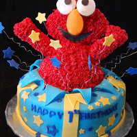 Elmo Cake Elmo cake I made for a friends nephew, inspired by all the elmo surprise cakes made before me. : )thanks for looking