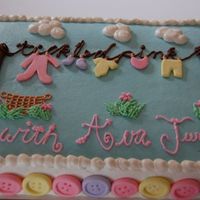 Tickled Pink Yet another clothesline cake! I enjoyed making the fondant buttons and this one definitely turned out better than the last--that's all...