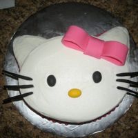 Hello Kitty Cake Chocolate cake with white b/c. Fondant bow, eyes and whiskers.