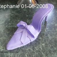 1Stfondantshoe.jpg My 2nd attempt at making a fondant shoe. I had a heck of a time putting plastic wrap on the sole of the shoe and then putting the top over...