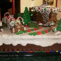 Hpim0221.jpg My 1st gingerbread cake. This cake was for our childrens church Christmas party. I saw several different cakes on CC and I couldn't...