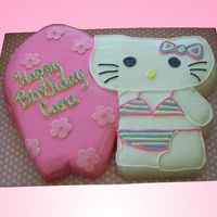 Hello Kitty Surfer I made this for a little girl's pool party. I used 2 9" x 13" sheet cakes side by side and just cut out the shape. All BC...