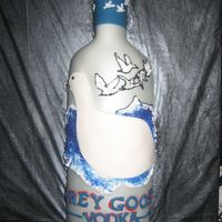 Grey Goose Bottle Do I REALLY need to explain?? LOL The cake is covered in fondant covered with gumpaste and piping gel.