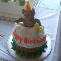 First Birthday Monkey Cake Monkey made from fondant/candy clay mixture. Got the idea from Wilton's 2009 yearbook.
