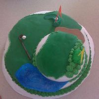 Golf Groom's Cake All fondant with royal icing borders and shrubs. Bride supplied the golf accessories. She made her own topper using the Wilton Runaway...