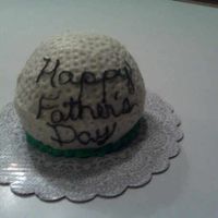 Happy Father's Day I made this cake for my dad (obviously) using the Wilton Ball Pan. I used the end of one of my dowl rods to make the dimples in the ball....
