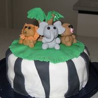 Jungle Cake Sons 2nd Birthday Party was a jungle safari theme. The smile I got when my son saw this cake was priceless! Made two round chocolate mud...