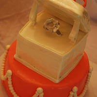 Ring Box Cake 10 inch round cake with pearls. That color is actually more pink than it looks. The customer asked for watermelon pink and didn't give...