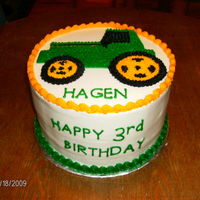John Deere Tractor Tractor done free hand, buttercream frosting