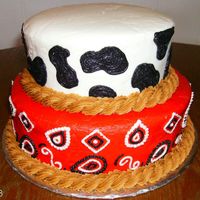 Cowboy Birthday Cowboy Birthday Cake, the boys mother put toy horses on top at the party. All buttercream.